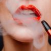 Vaping and CF | Girl with red lipstick vaping