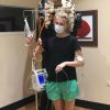 Girl standing with medical equipment around her body | CF and Trikafta