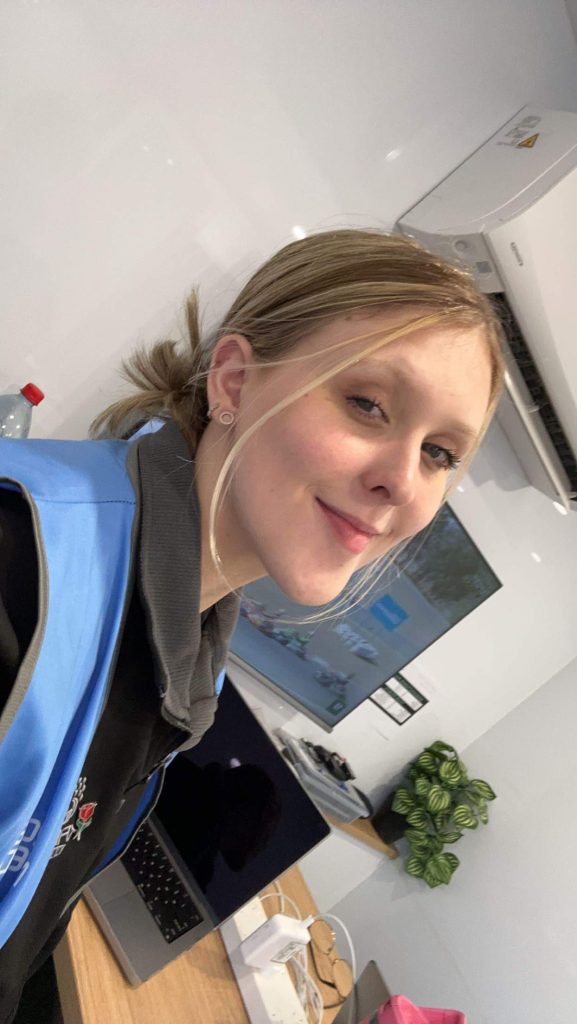 Girl smiling in an office | CF and the Future