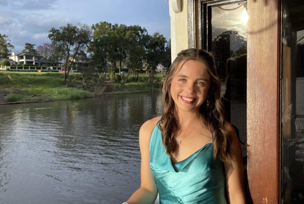 Girl standing by the water | CF and medical devices