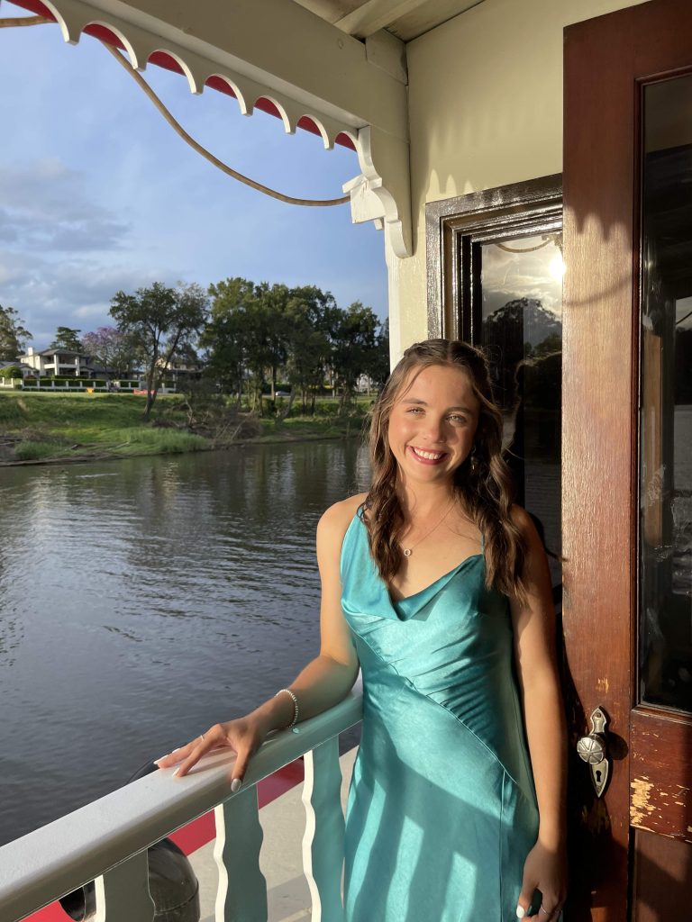 Girl standing by the water | CF and medical devices